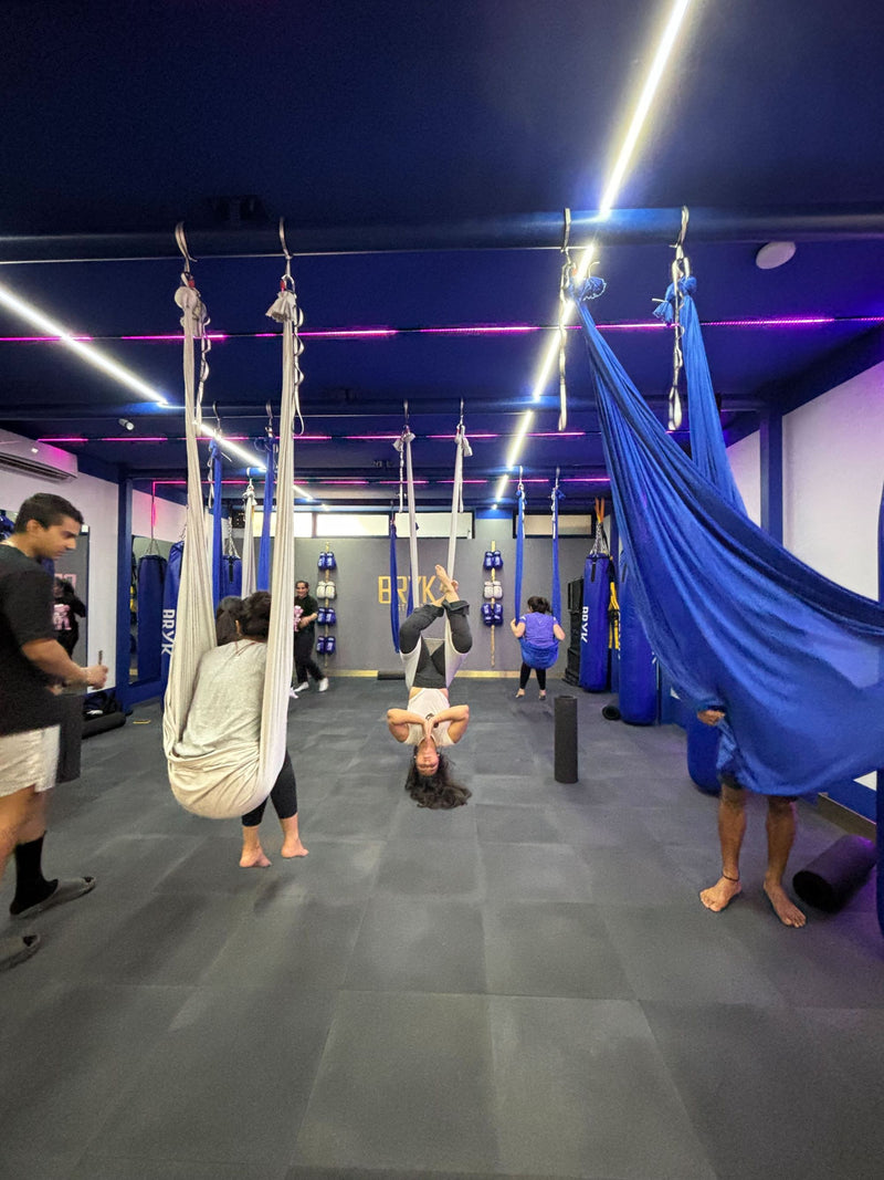 Participants performing arial activities at the Savikalpa event