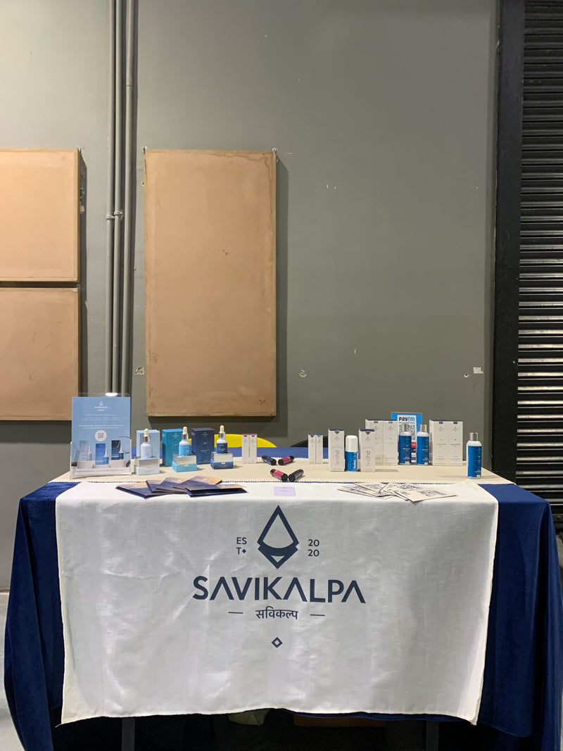 A pre-event promotional booth setup for Savikalpa at all women climbing session.