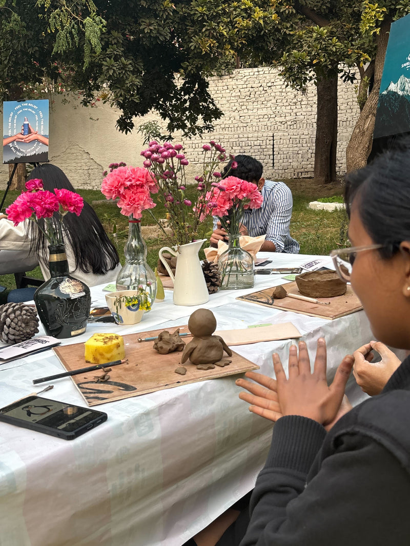 People practing pottery