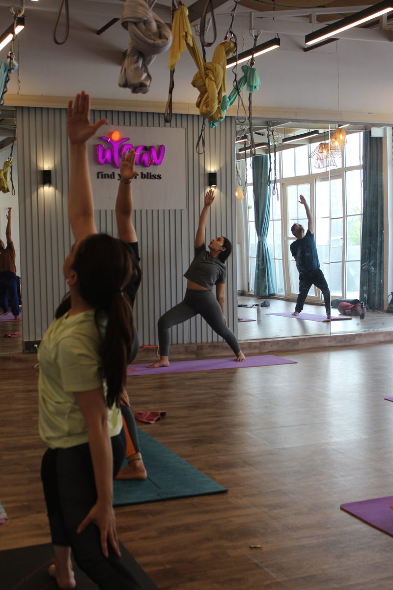 Stretching yoga with Simren Kaley at Utsav