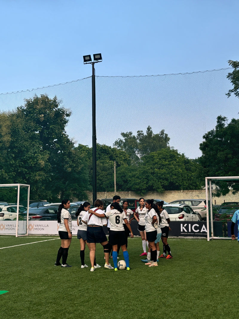 Team huddle at Womens Football League