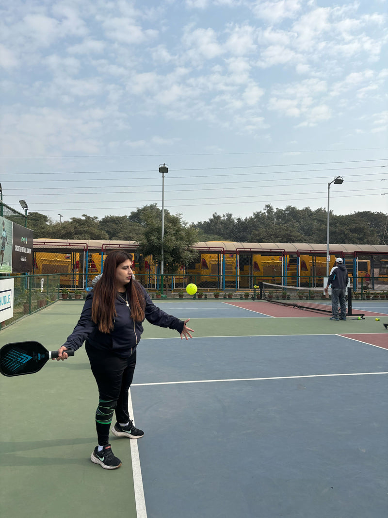 Women-practicing-pickleball-shot 