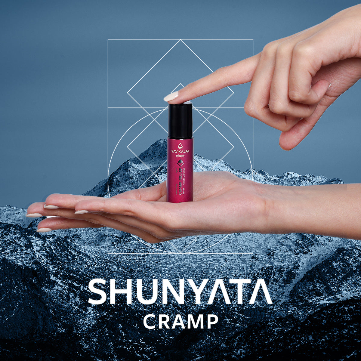 Shunyata Cramp Relief in the hands of a woman set against a snowy mountain top to denote a sense of calmness and peace.